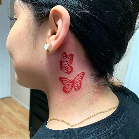 Fluttering Beauty: The Butterfly Behind Ear Tattoo Trend